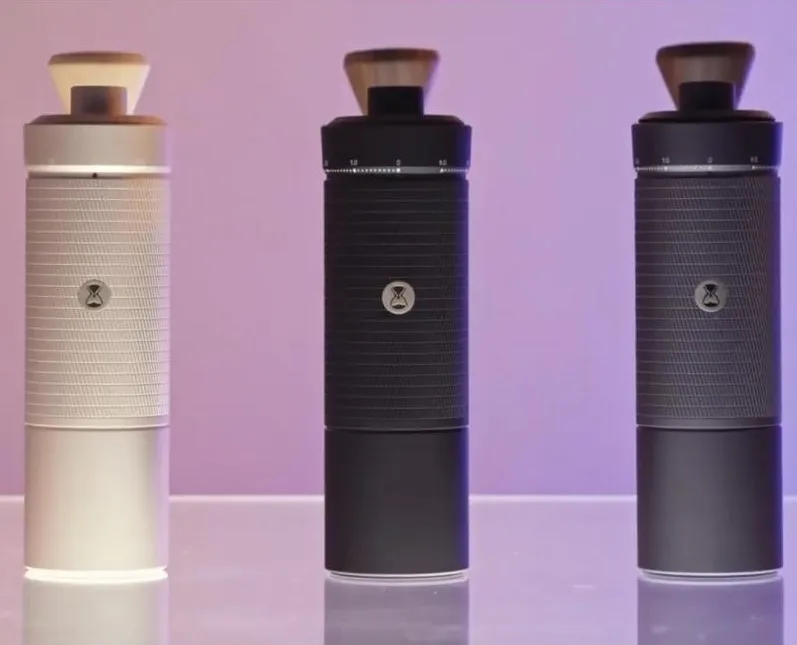 Champagne, black and dark gray C6 grinders standing in a row