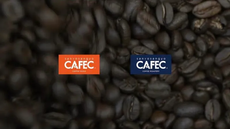 Cafec’s orange Coffee Tools logo next to the new navy Coffee Roastery logo, over roasted beans