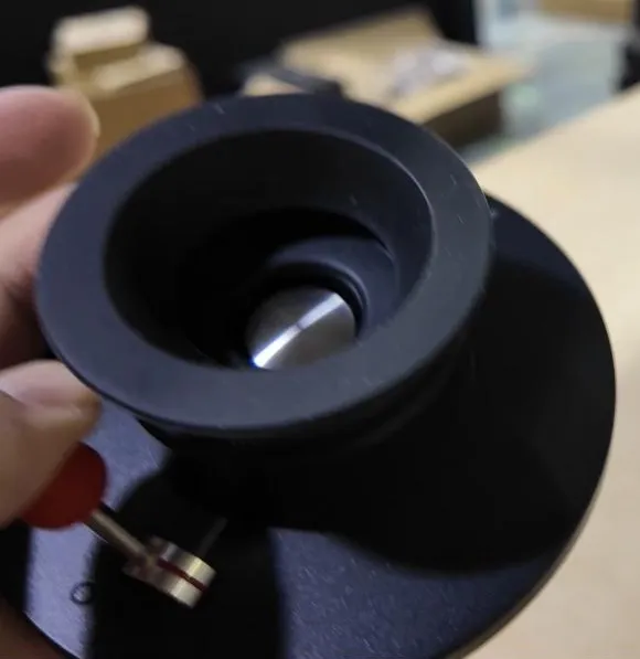 The Timemore Delta base with the dripper removed, showing the metal valve in the center
